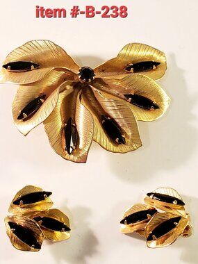 1 Gold Brooch with matching clip on Earrings, item# B-238, wt. 31 grams.